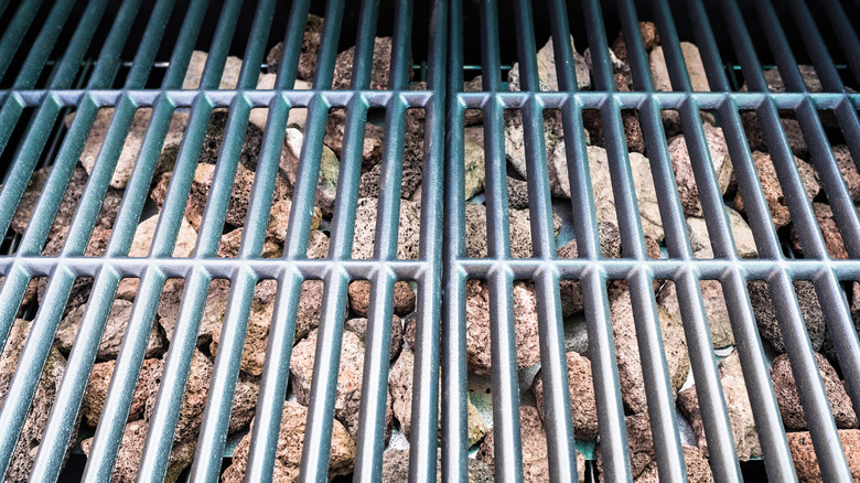 Lava rocks below grill grates