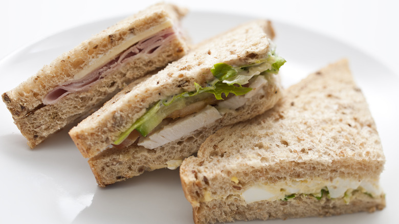 Three sandwiches on a plate