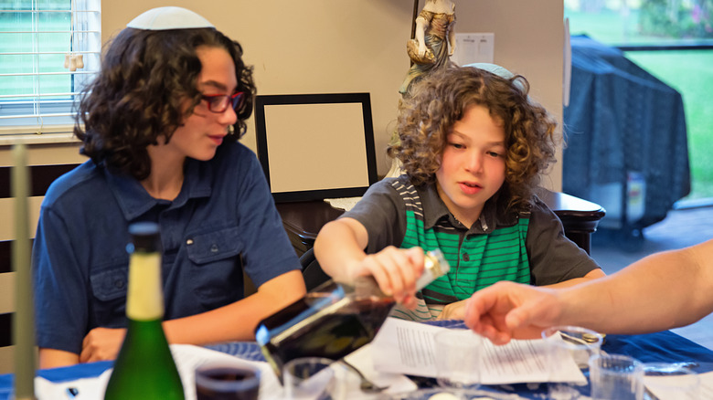 Children having Seder wine