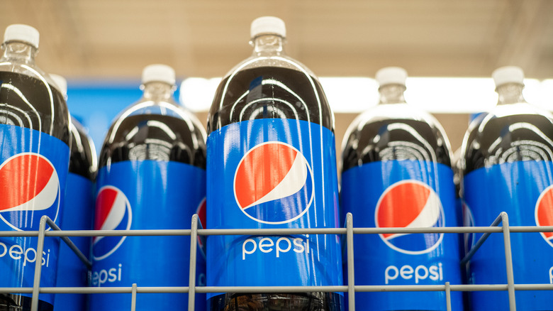 Bottles of Pepsi on shelf