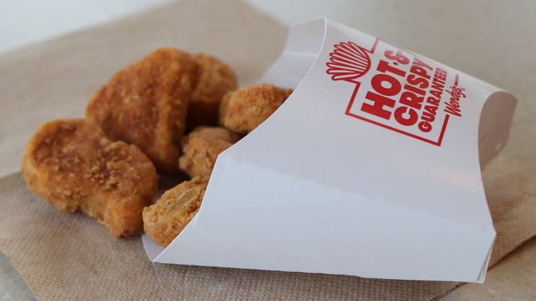 Wendy's chicken nuggets spilling out of container