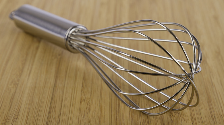 Whisk on table