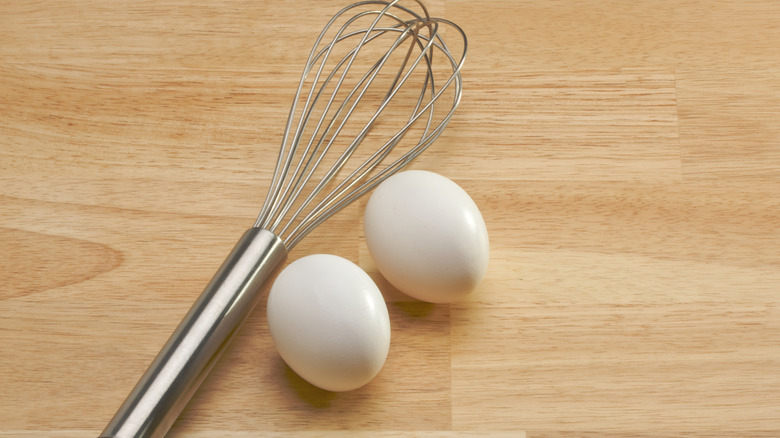 Hard-boiled eggs and whisk