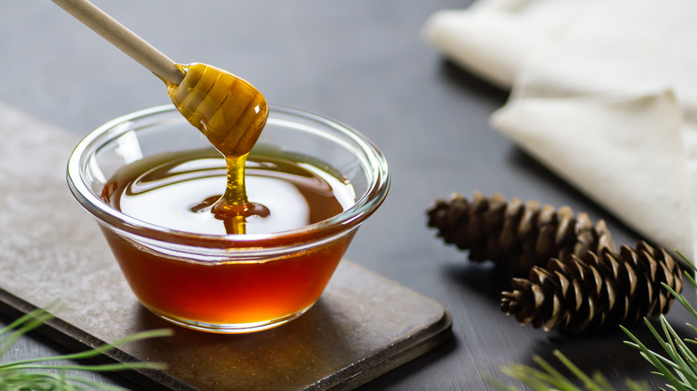 Honey dipper in bowl