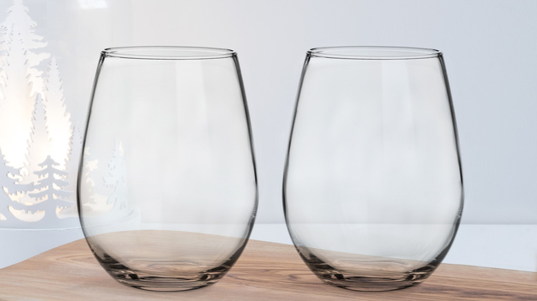 Two stemless wine glasses