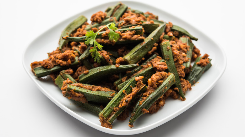 stuffed okra on white plate