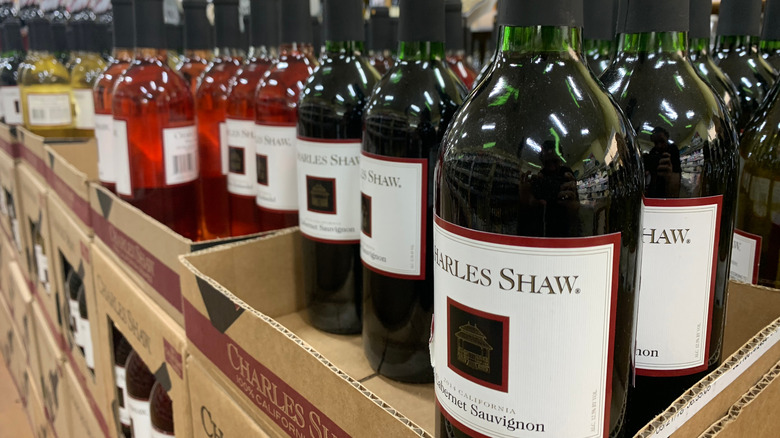 Array of Charles Shaw wine in cardboard boxes