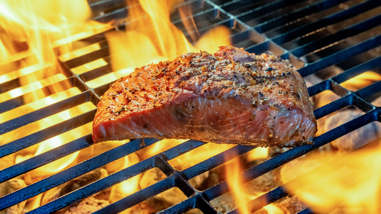 steak over fire wood grill