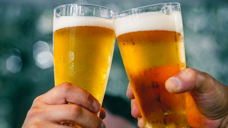 People toasting with beer