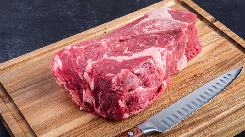 beef chuck roast on cutting board