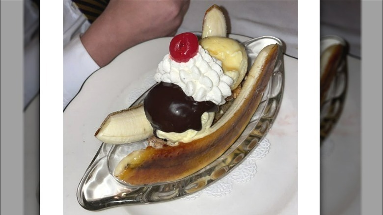 Banana split on glass plate