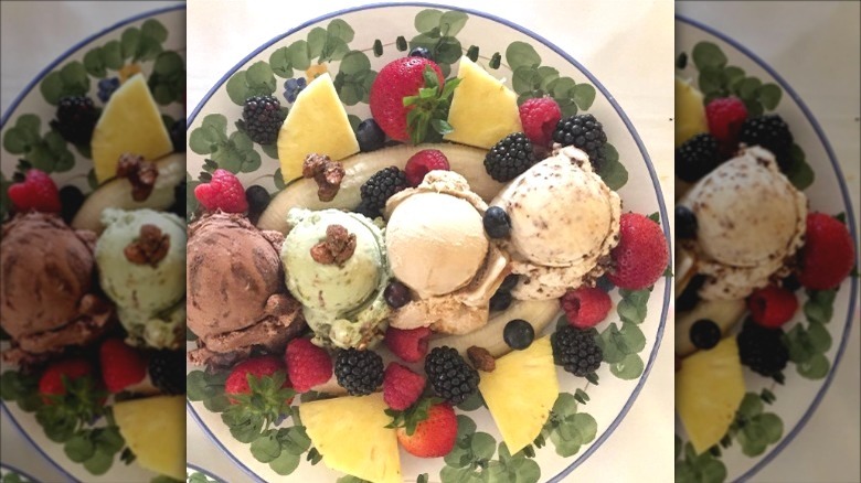 Banana split with berries pineapple