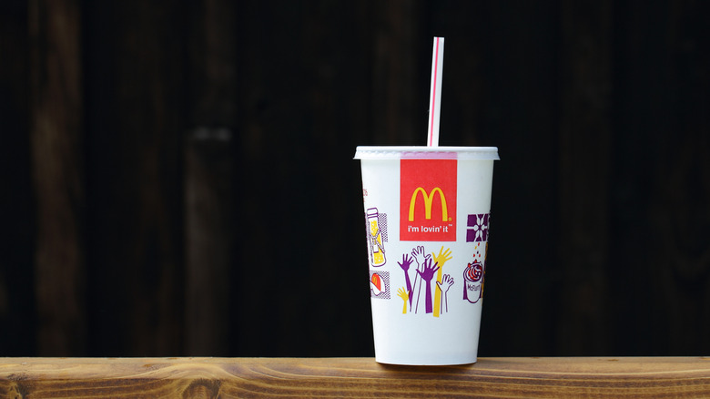 McDonald's cup on a black background