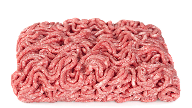 Ground meat on white background