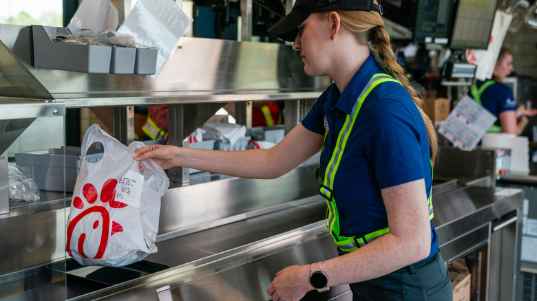 Chick-fil-A employee preparing order