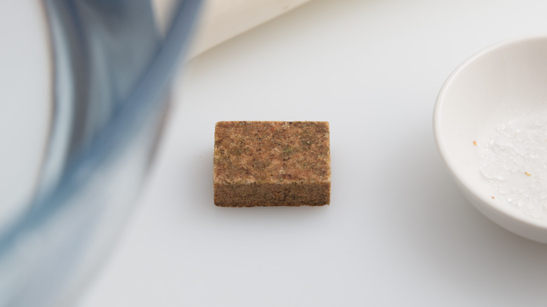 One bullion cube on a countertop