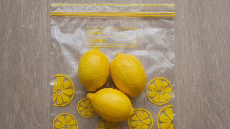 Resealable plastic bag with three lemons