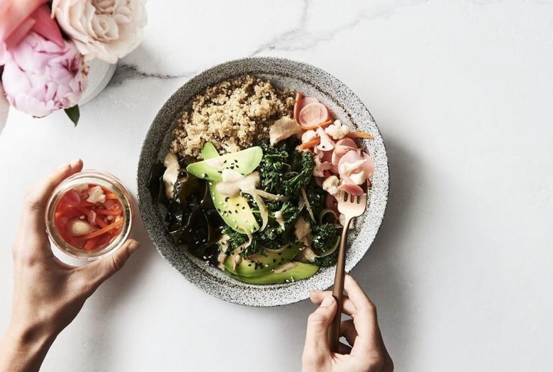 Kale Bowl With Quinoa, Fermented Vegetables, Wakame, and Avocado