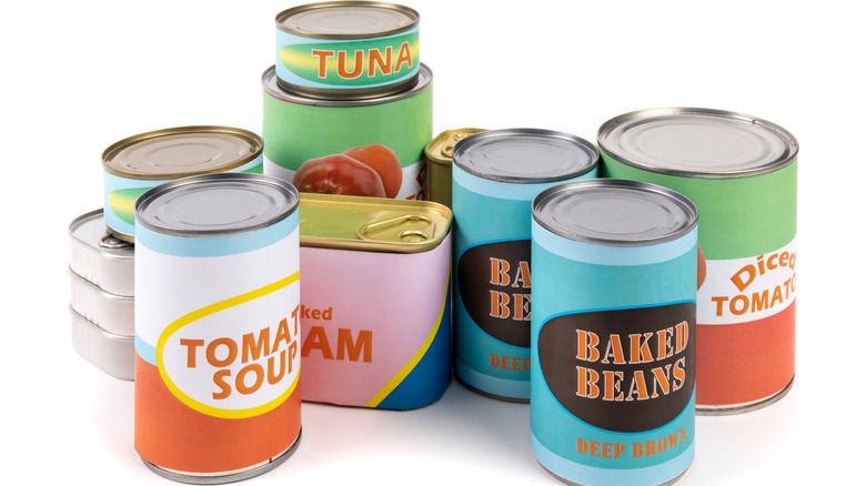 Canned foods on white background