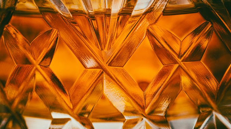 close up of whiskey in glass