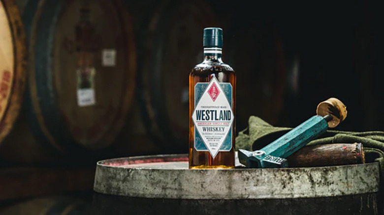 Westland whiskey bottle on barrel