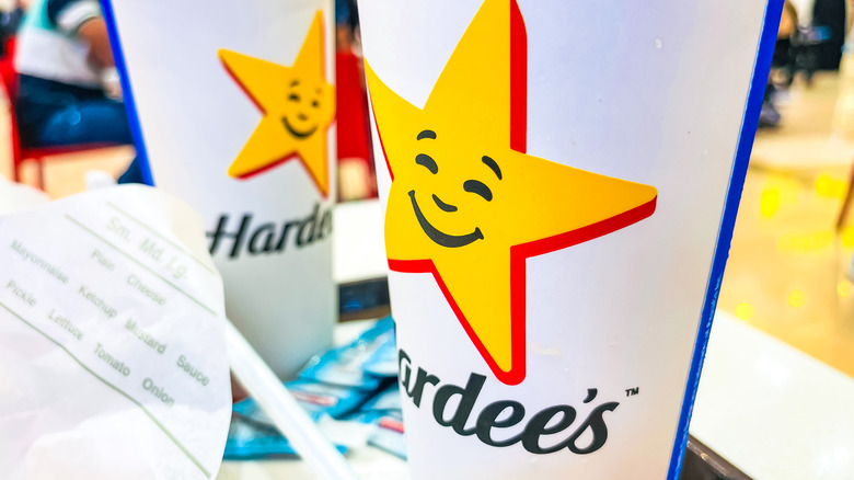 Hardee's cups standing on tray