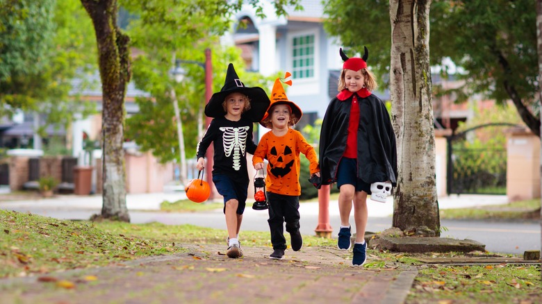 costumed kids trick-or-treating