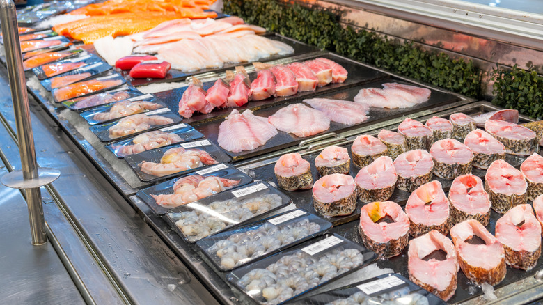 Seafood on display at a fishmonger's counter