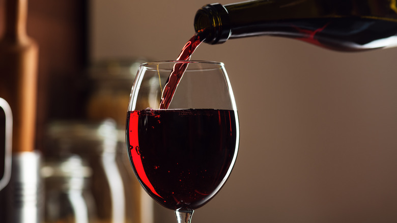 Red wine being poured into glass