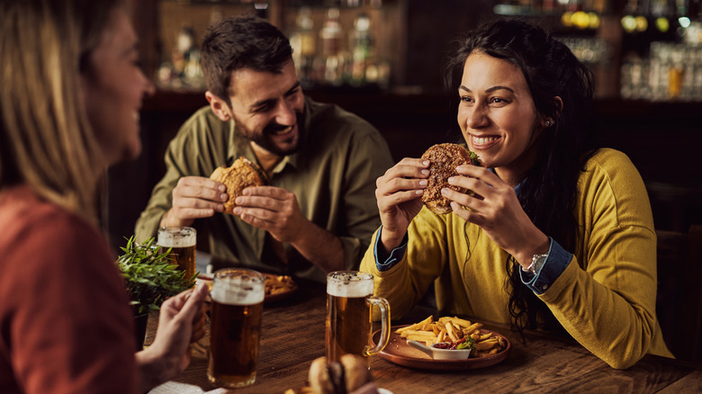 Friends eating at a pub