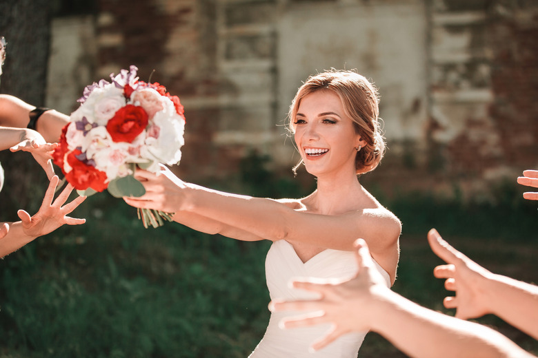 Get aggressive during the bouquet toss 