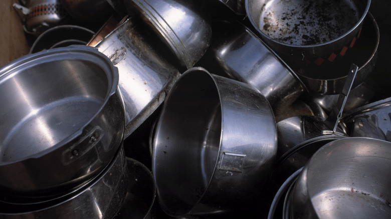 pile of dirty cookware