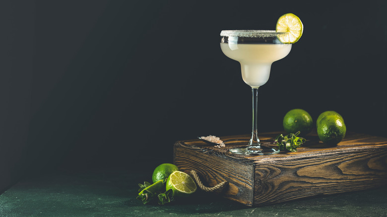 Classic frozen margarita and limes