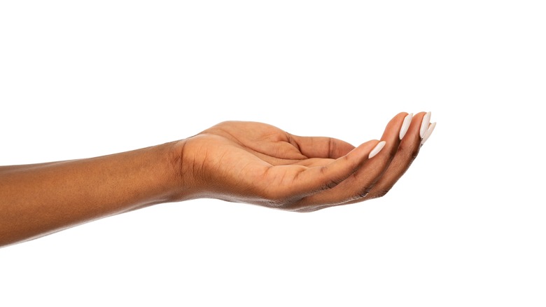 person's hand cupped upwards