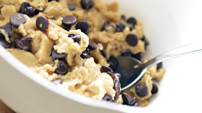 mixing cookie dough in bowl