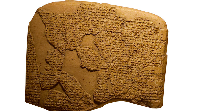 Cuneiform inscribing on ancient clay tablet