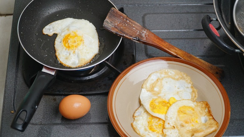 Fried eggs with yolks cooked