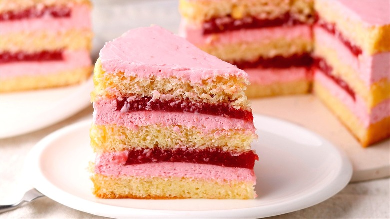 Pink layer cake with jam 