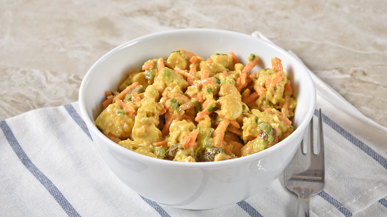 A bowl of curried chicken salad