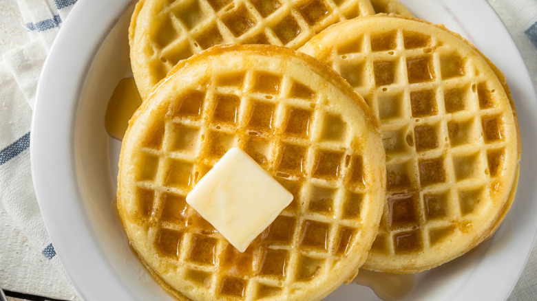 waffles with butter and syrup