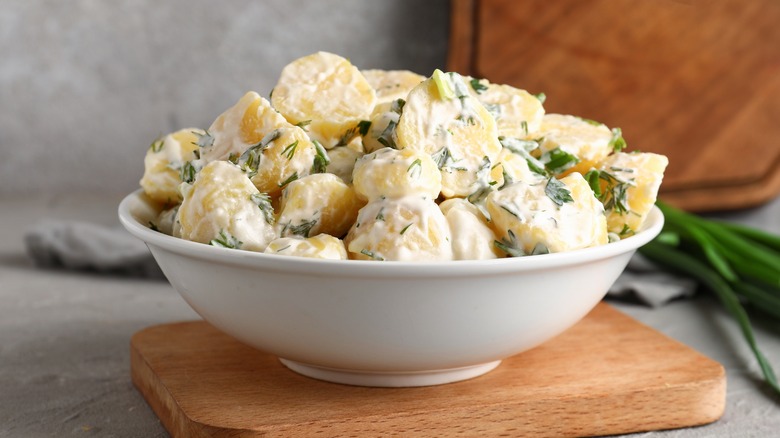 potato salad in white bowl