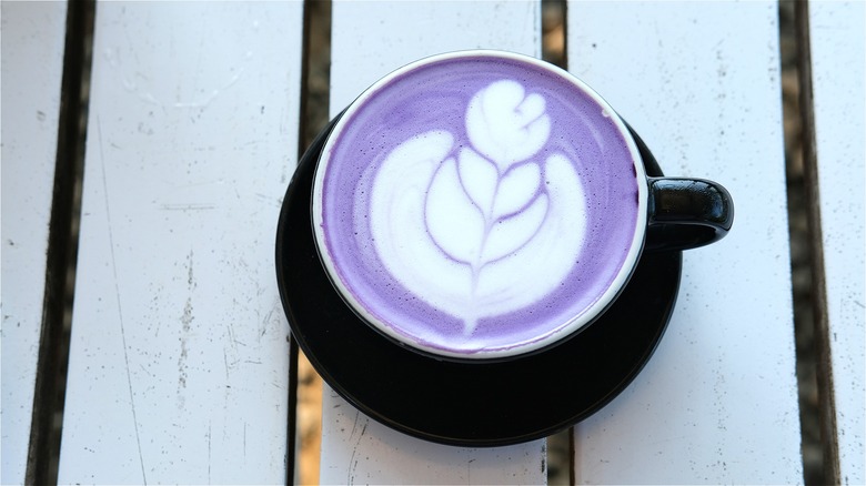 ube latte on wooden table