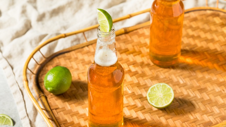 Mexican lager in bottles with lime