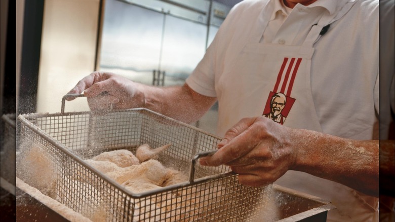 KFC chicken being breaded