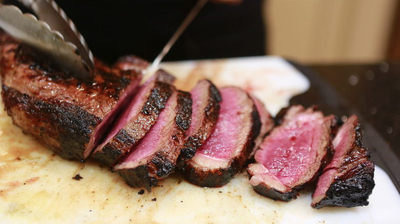 cutting a steak