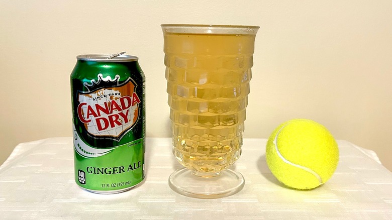 Ginger ale and tennis ball