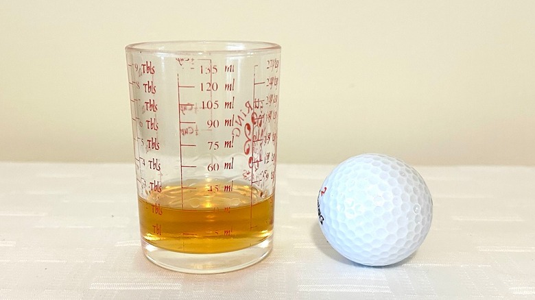 Whiskey and golf ball