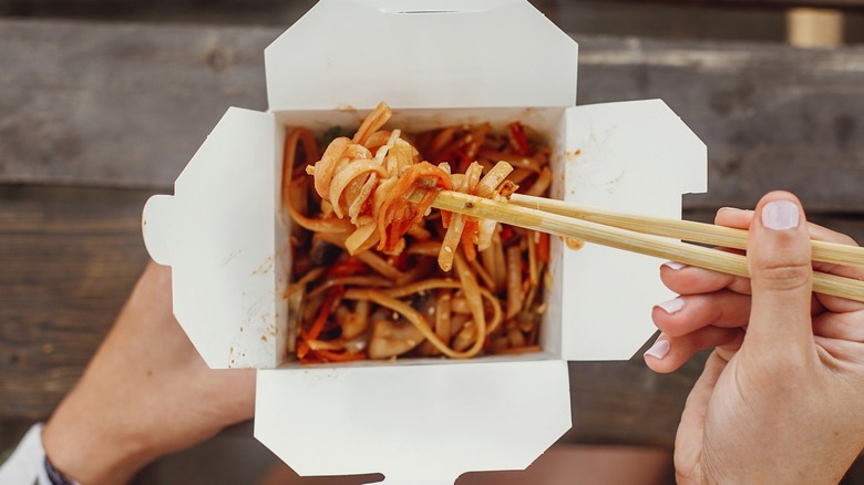 Chopsticks in Chinese takeout box