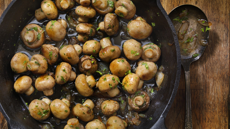 Pan of cooking mushrooms