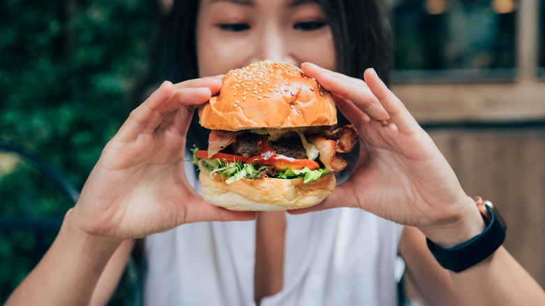 woman eating a burger